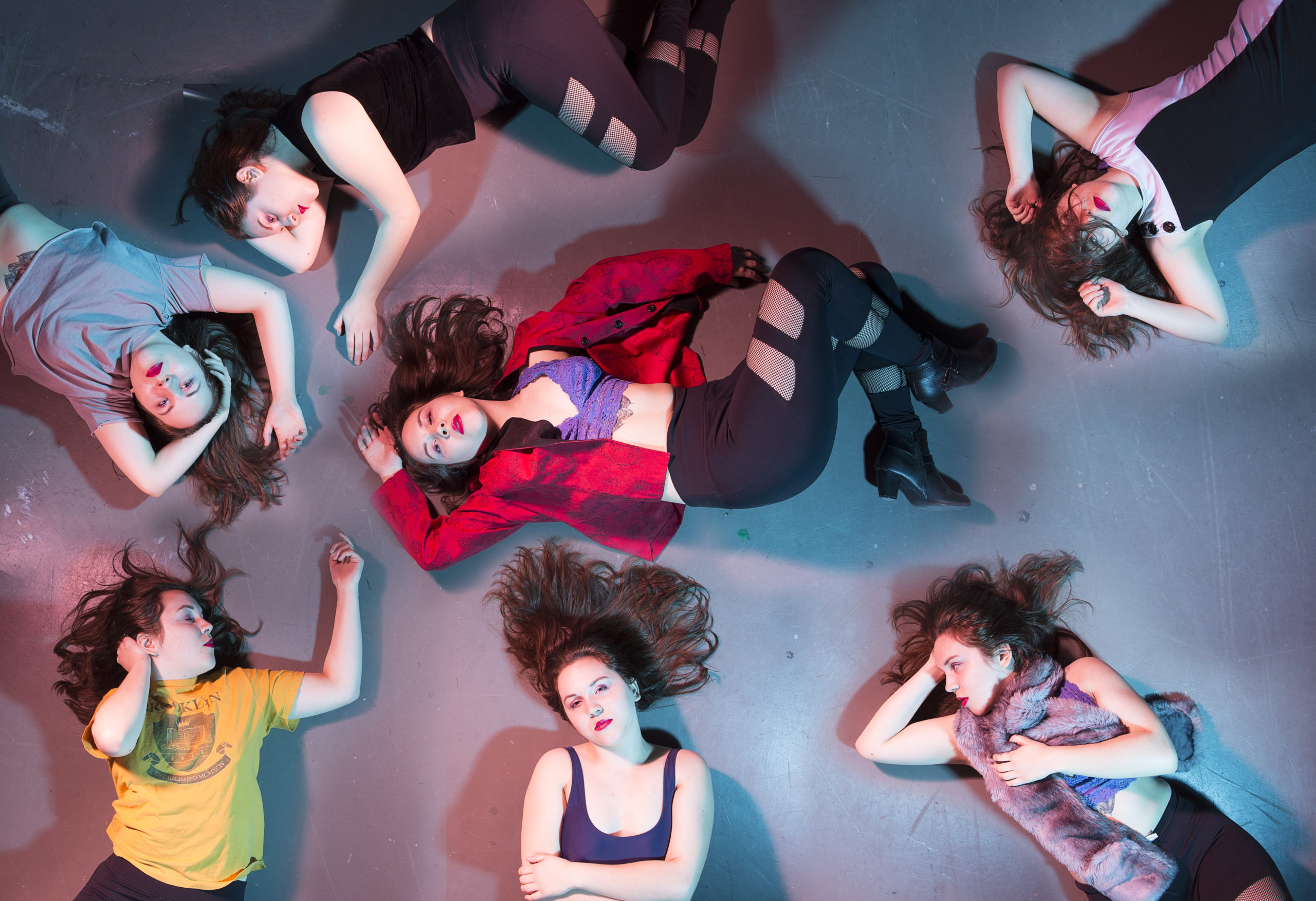 Inspired by Beatrice eli's music video for "girls" this image sepicts the artist in a variety of different "party" outfits, lying on the floor, shot from a bird's eye view,
