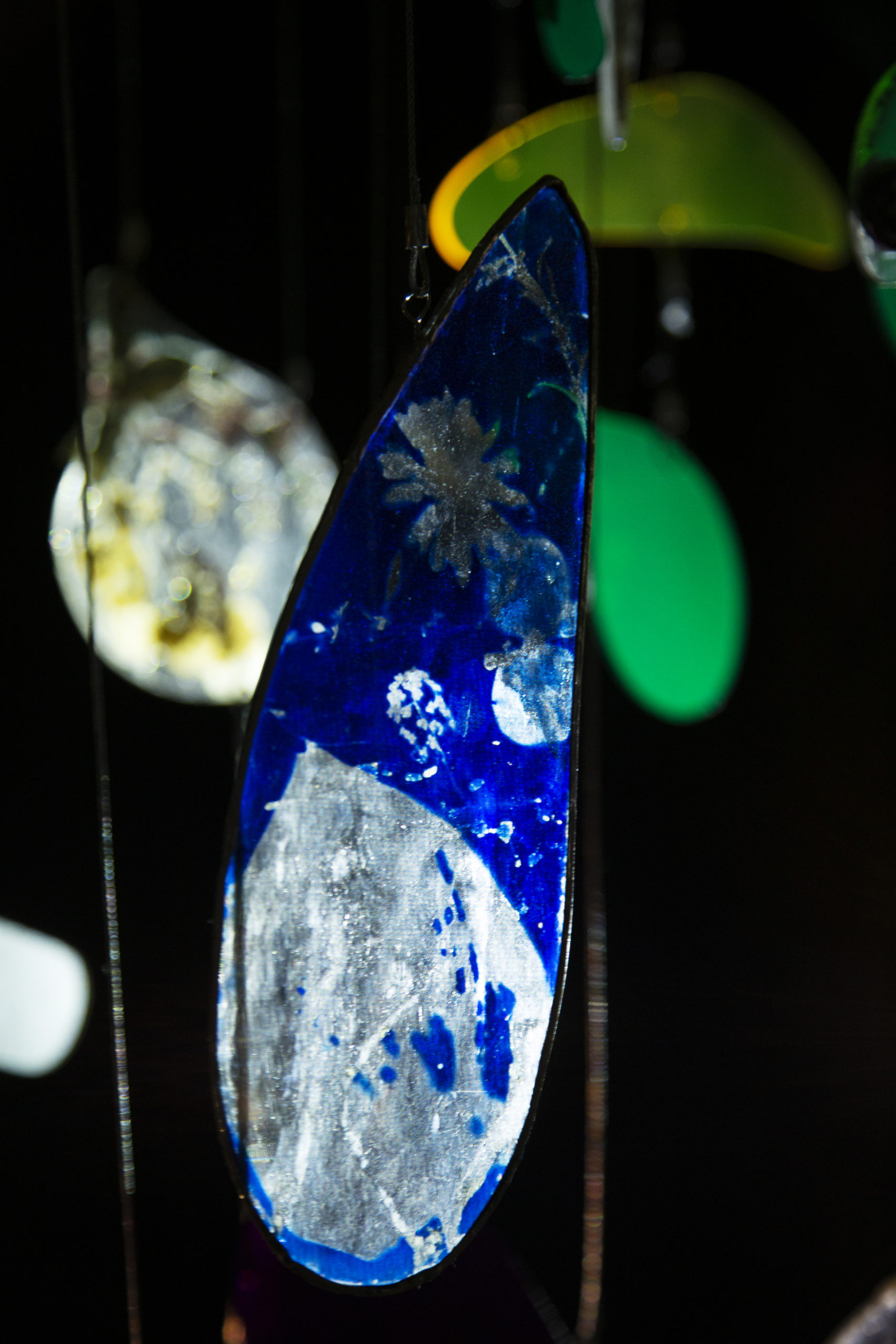 detail of a cyanotyped glass panel